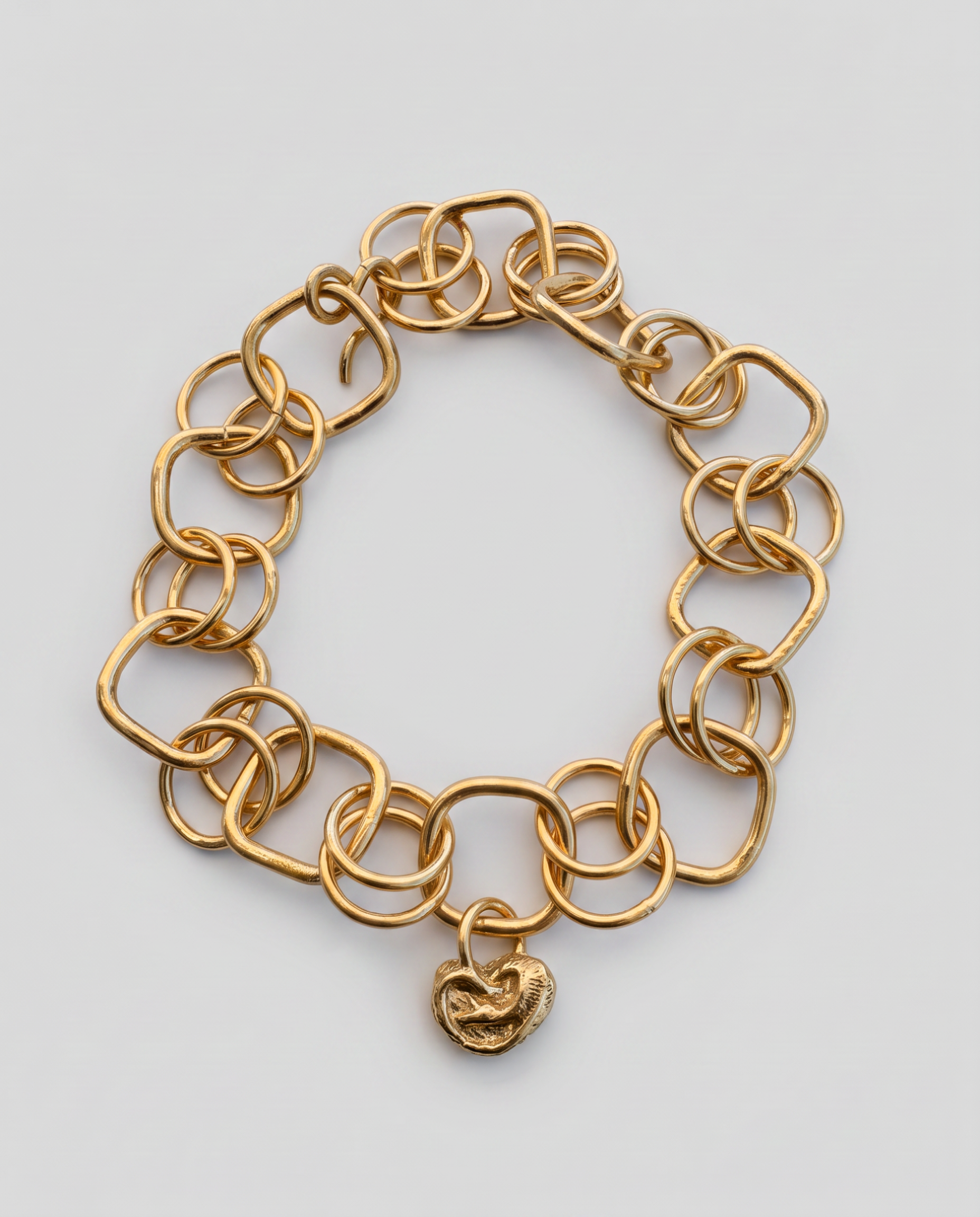 Gold chain bracelet with ear charm