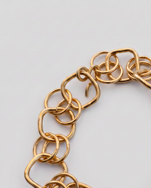 Gold chain bracelet with ear charm